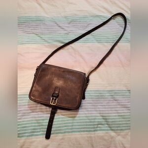 Brown vintage Coach saddle bag